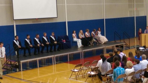 This year's Homecoming Royalty waits for the king and queen to be crowned during the coronation ceremony. (L-R) Matt Tate, Jakob Kilby, Schafer Overgaard, Jay Skaar, Foster Otten, Karina Stripe, Calin Adams, Ahnika Jensen, Katie Rassmussen, and Francesca Eckstrom.