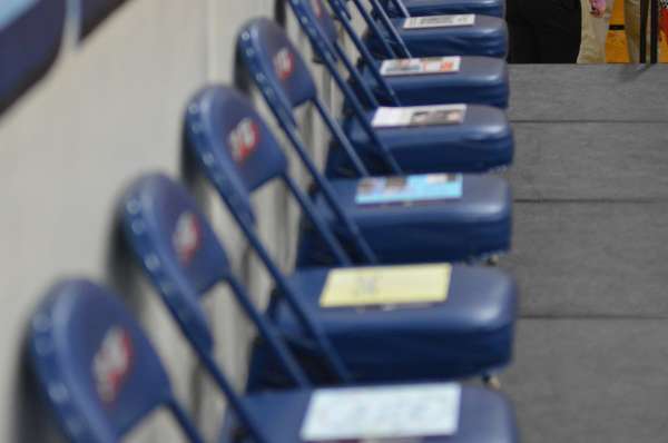 The chairs lined up, with each nominees tile.