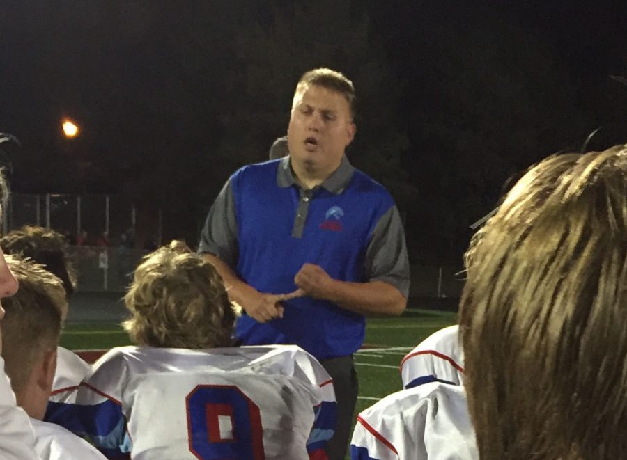 Corey Black talks to his team during a game. Black has been a part of the Albert Lea football program for years before becoming head coach. 