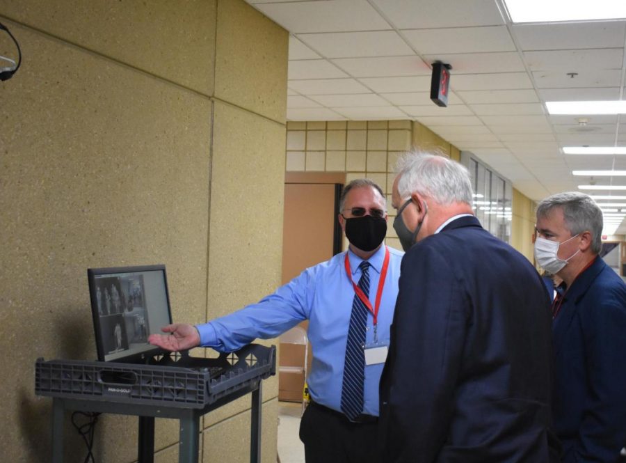 ALHS Principal Mark Grossklaus and Superintendent Mike Funk show Minnesota Governor Tim Walz the thermal scanners inside of the building. The scanners were installed as a safety precaution that was taken in order to prevent the spread of COVID-19 among the students and staff. Our hope is that whats happened here is happening across the state, Walz said. Youve got a really good, robust system put in place that keeps you safe.