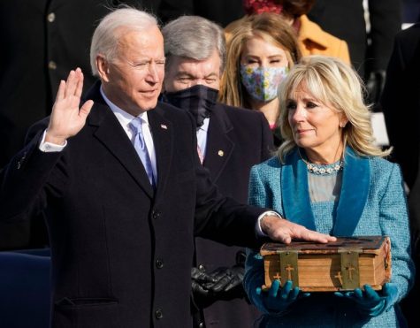 President Joe Biden placing a hand on a historic family bible as he is sworn in to office. Many Americans watched on as TV screens showed the Jan 20 inauguration and the speeches that took place. With unity we can do great things, Important things, said President Biden. We can right wrongs.