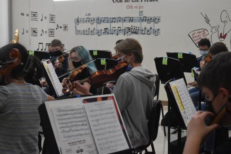 Students in the Symphony Orchestra practice their music during class. This orchestra is one of the many electives available to students, while the chamber orchestra is an extracurricular available to musicians looking for an opportunity to play more advanced music.