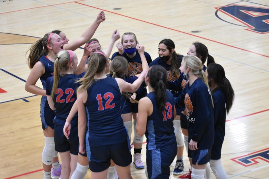 The girls celebrate their win.