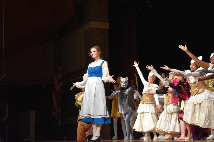 Ava Cunningham as Belle, one of the leads of Beauty and the Beast. 