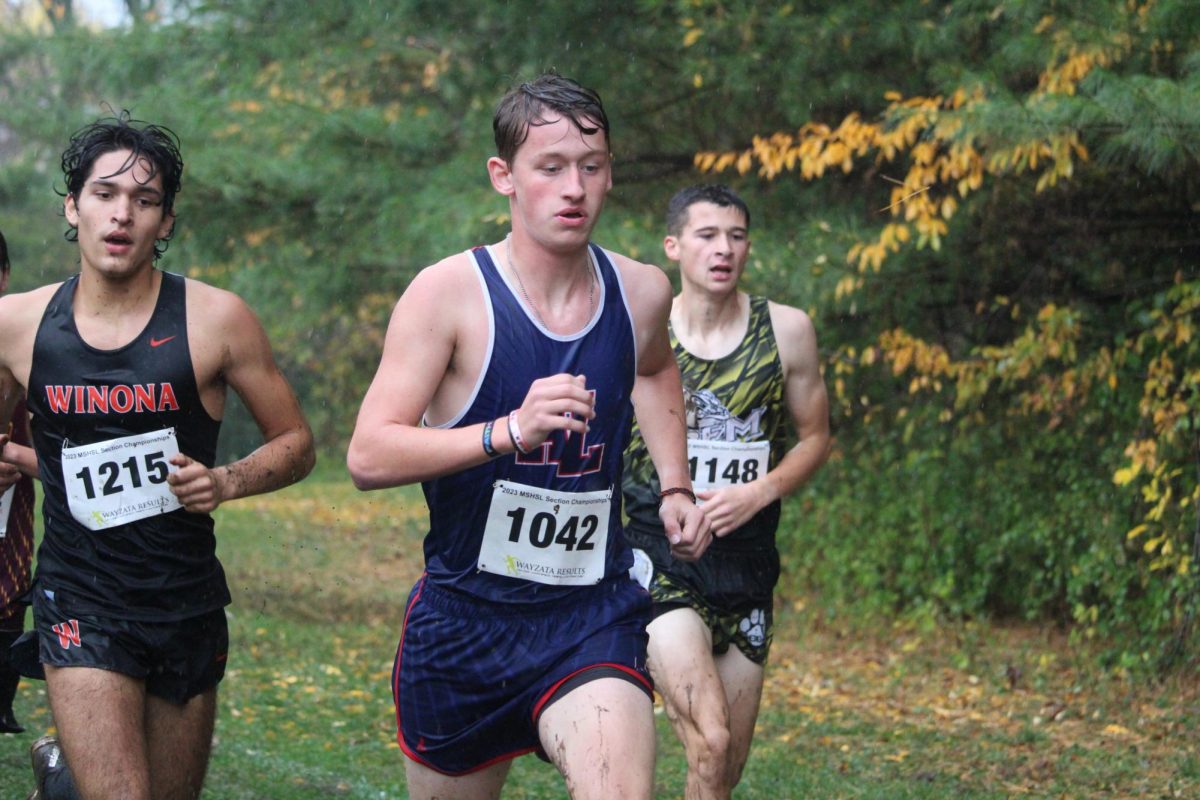 Isaiah McGaffey running for Albert Lea.