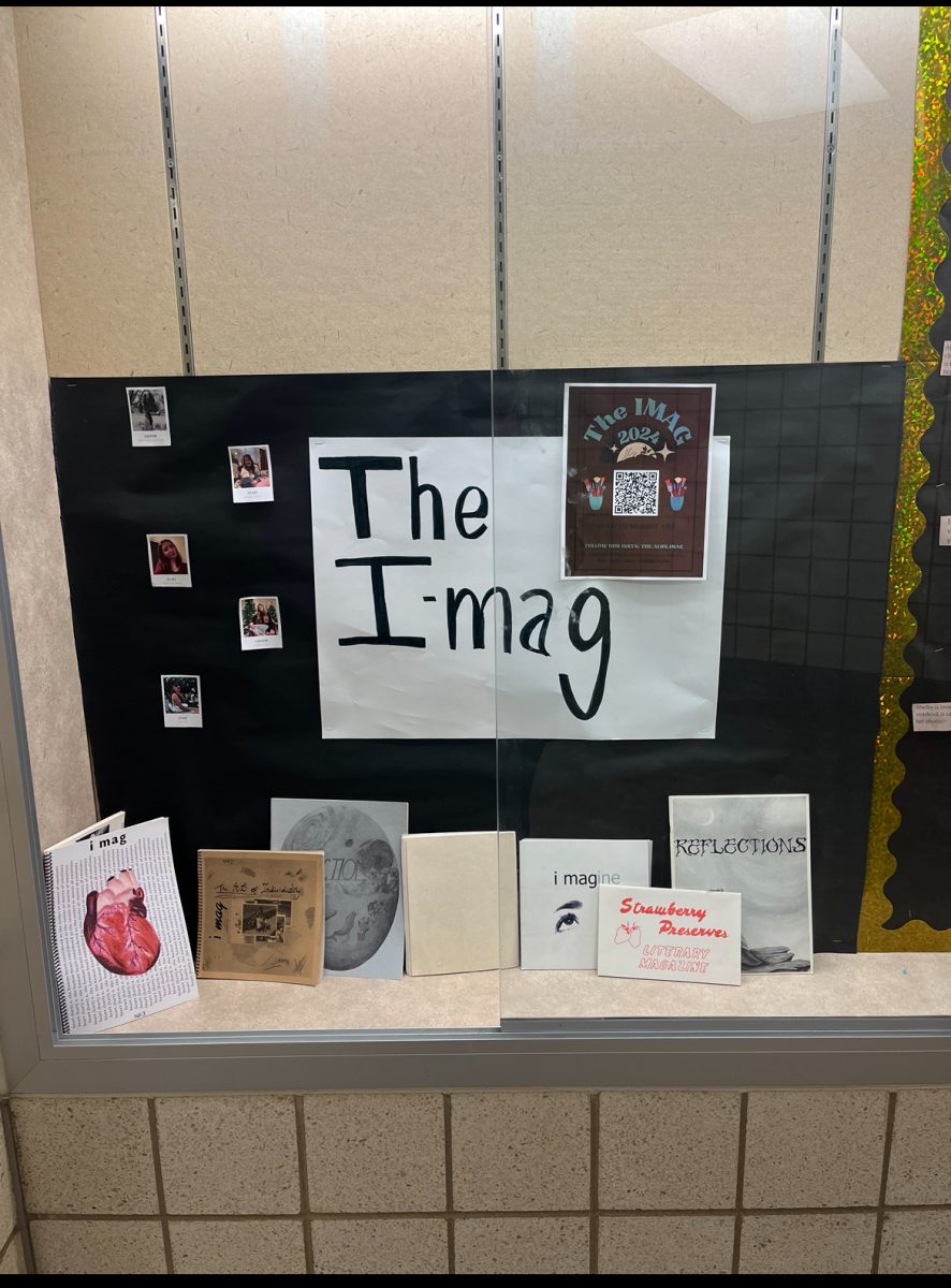 The+Imag+display+case+located+outside+of+the+upper+E+House+has+past+Imags+for+students+to+see.+Most+English+teachers+also+have+copies+of+the+literary+magazine+in+their+classrooms