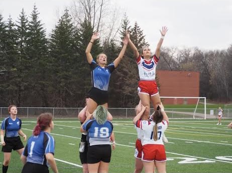 Senior Lillian Hernandez in a past rugby match against Eagan, where she was a jumper.