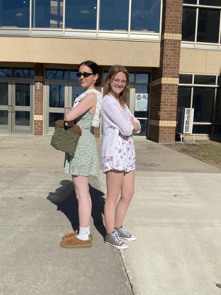 Editor Rosa Corey-Gruenes (11) and Josephine Petersen (11) show off their ten dollar outfits thrifted from The Salvation Army in early March.