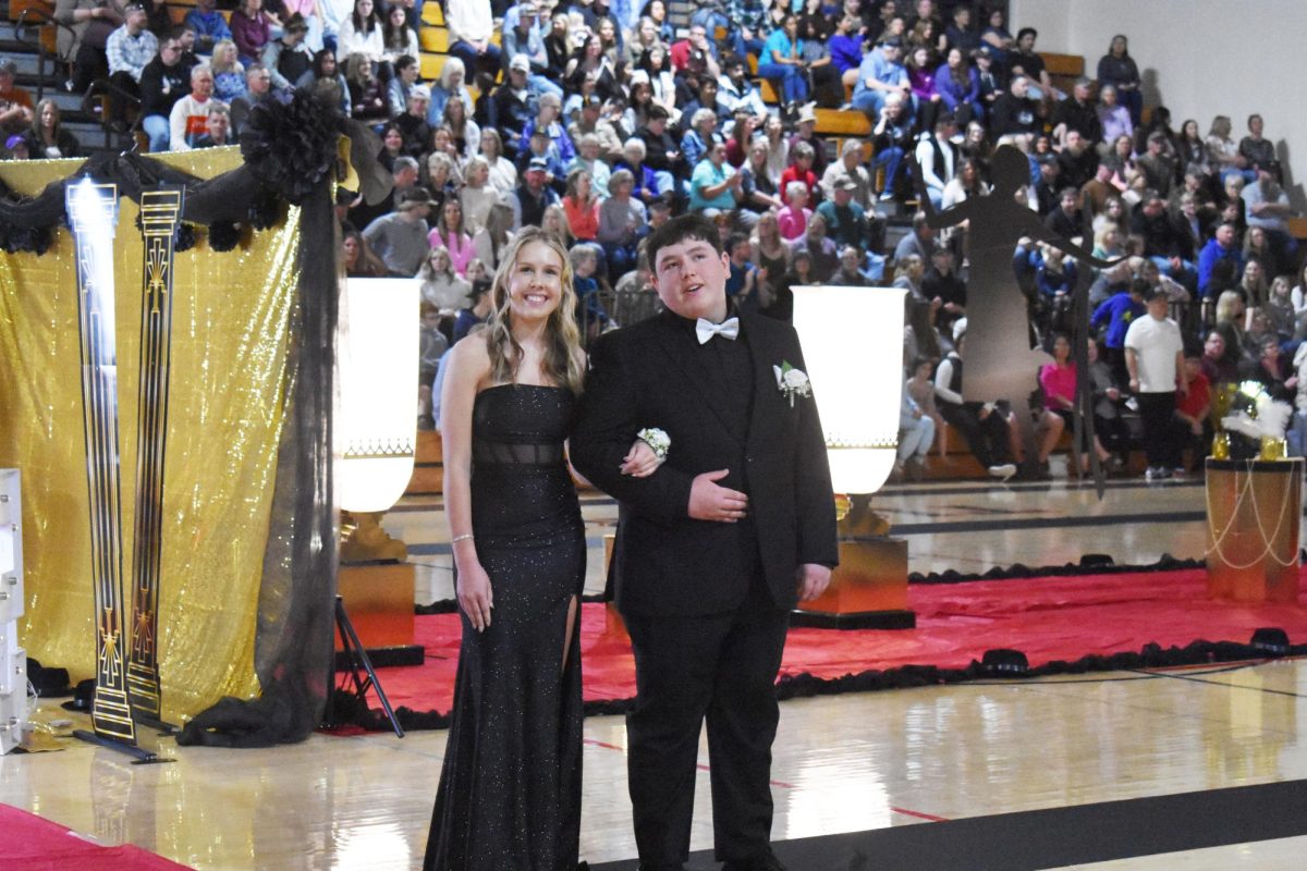 Taylor Klocke (11) walking with her date at Promenade on April 26.