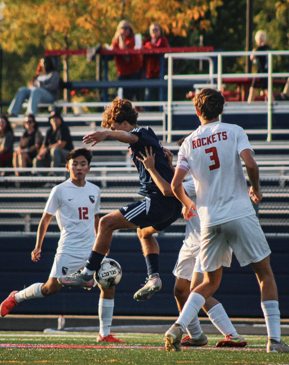 Izaiah Palomo (10) at the varsity boys' soccer game versus Rochester JM on September 11.