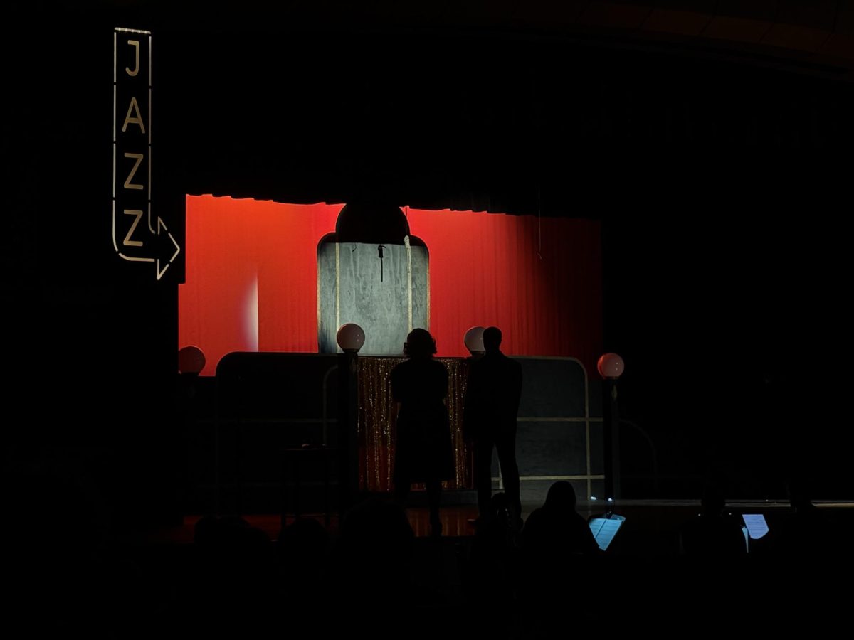Selah Griffith (11) and Kuol Dual (11) during the dress rehearsal of "Chicago" on April 7th. 
