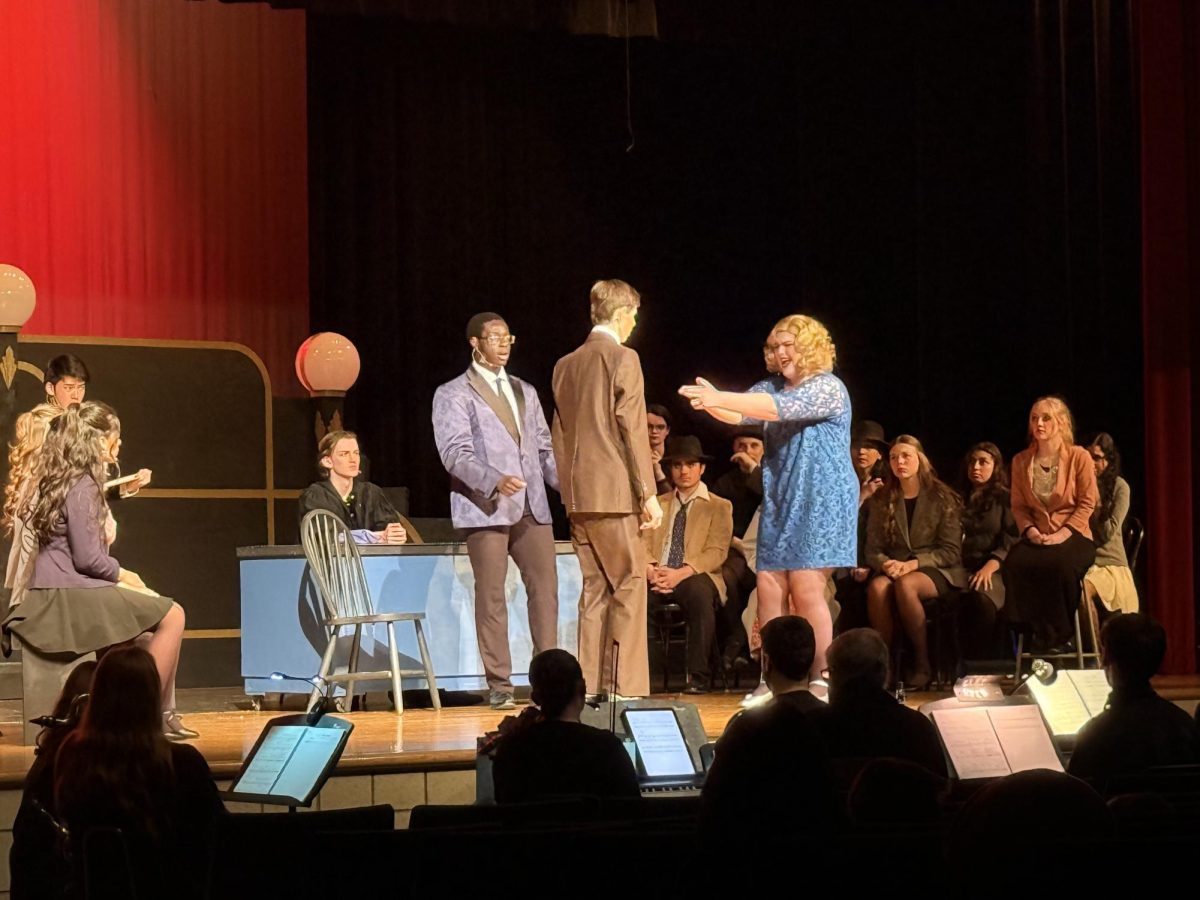 Jackson Bighley (10) and Selah Griffith (11) on April 7th during "Chicago"'s dress rehearsal. 