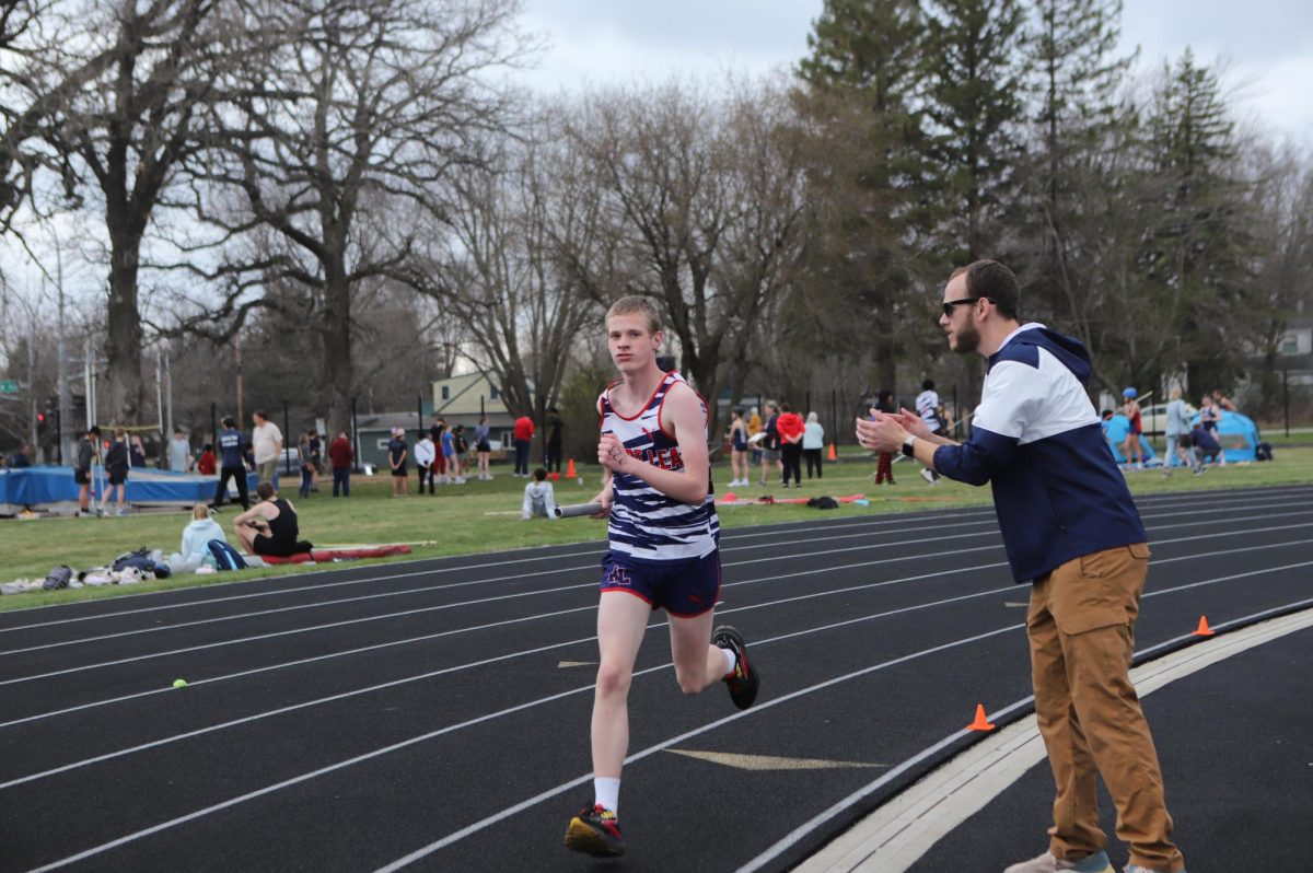Jackson Gaston (9) running during the Track and Field meet on April 14.