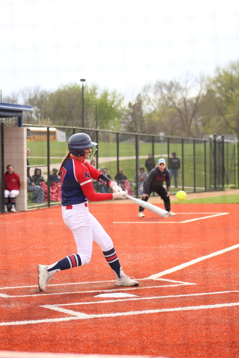 Taylor Johnson (12) batting during the Girls Softball game against Rochester John Marshall on April 28.