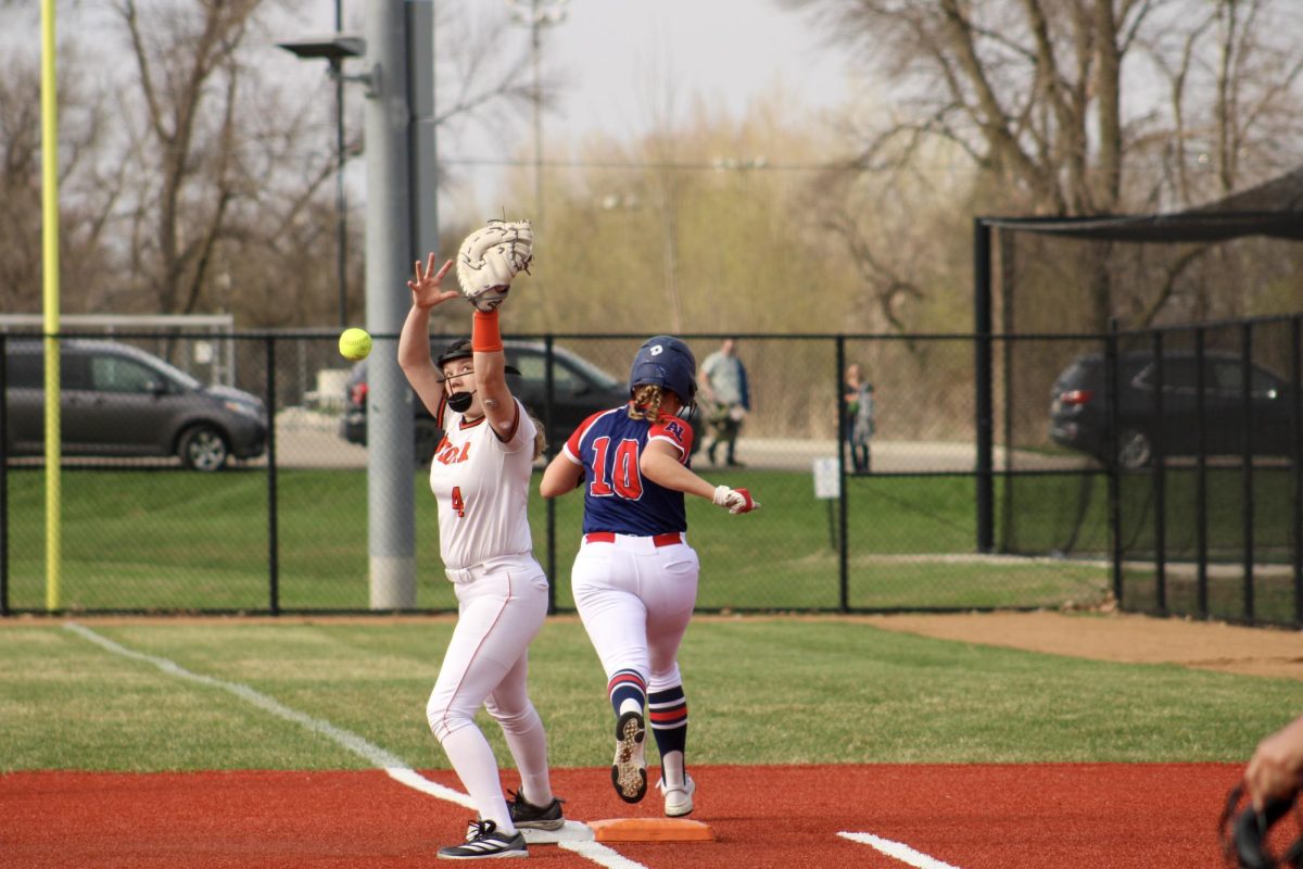 Sienna Murray (11) batting at the Girls Softball game against Rochester Mayo on April 7.